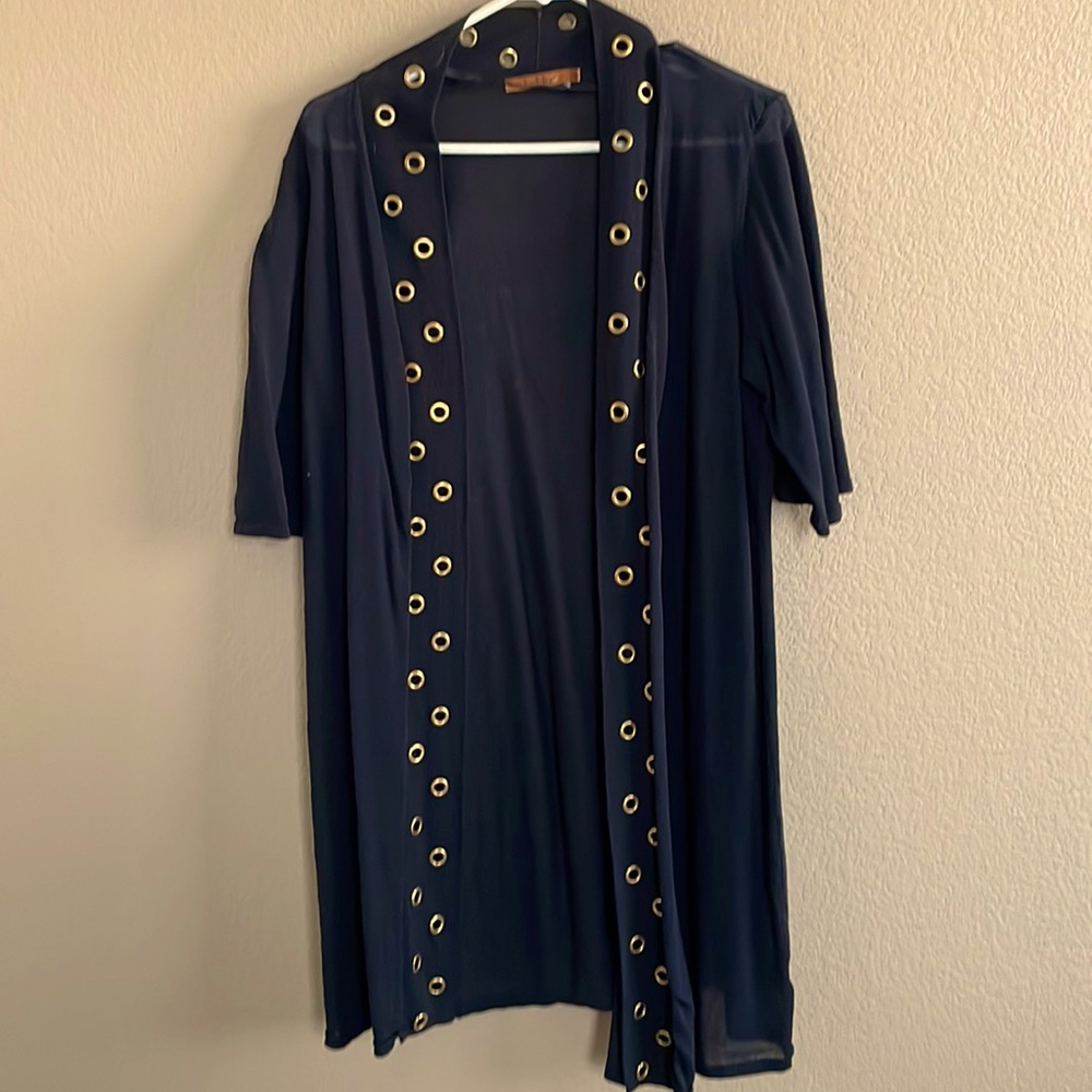 Black camisole with gold fixtures